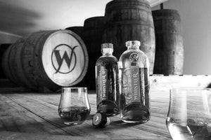 Whistler South African Style Rum rum with barrels in background